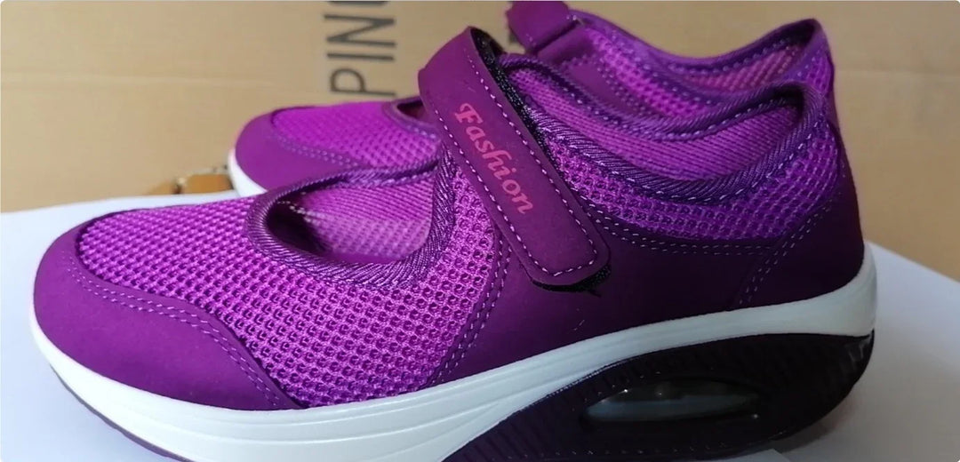 Purple mesh athletic shoes with white soles and velcro straps labeled Fashion