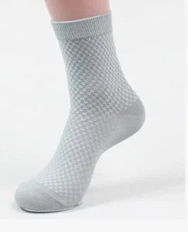 Light gray ankle socks with a textured diamond pattern on a white background