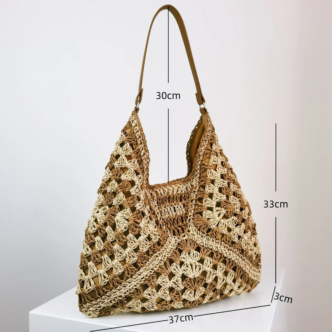 Handmade beige and brown crochet shoulder bag with 30cm strap, 33cm height, and 37cm width