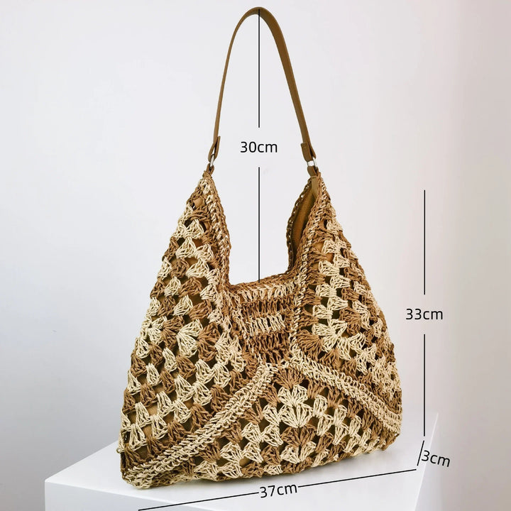 Handmade beige and brown crochet shoulder bag with 30cm strap, 33cm height, and 37cm width