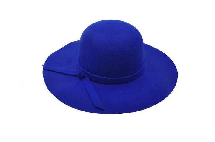 Bright blue wide-brimmed felt hat with a matching ribbon bow on white background