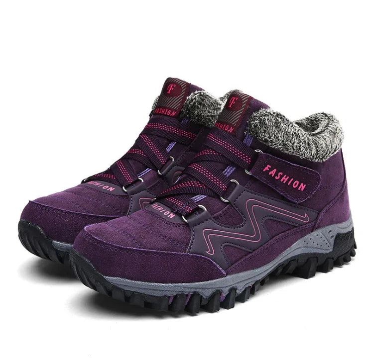 Purple winter hiking boots with faux fur lining, rugged sole, and pink fashion accents