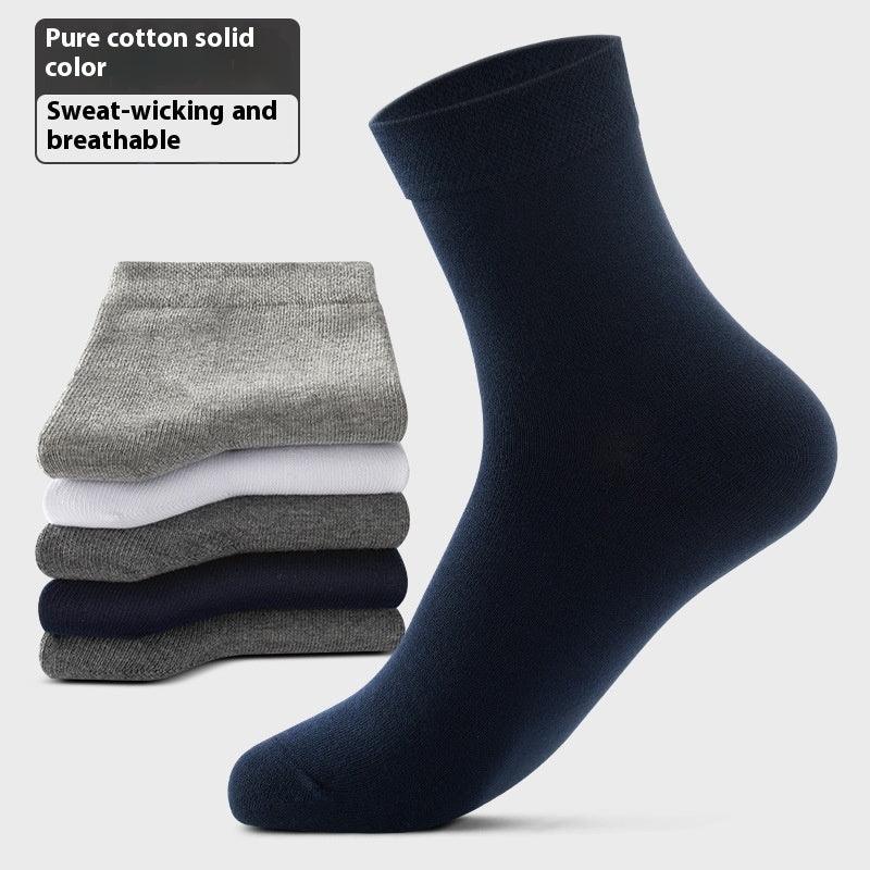 Stack of pure cotton solid color socks in grey, white, navy, advertised as sweat-wicking and breathable