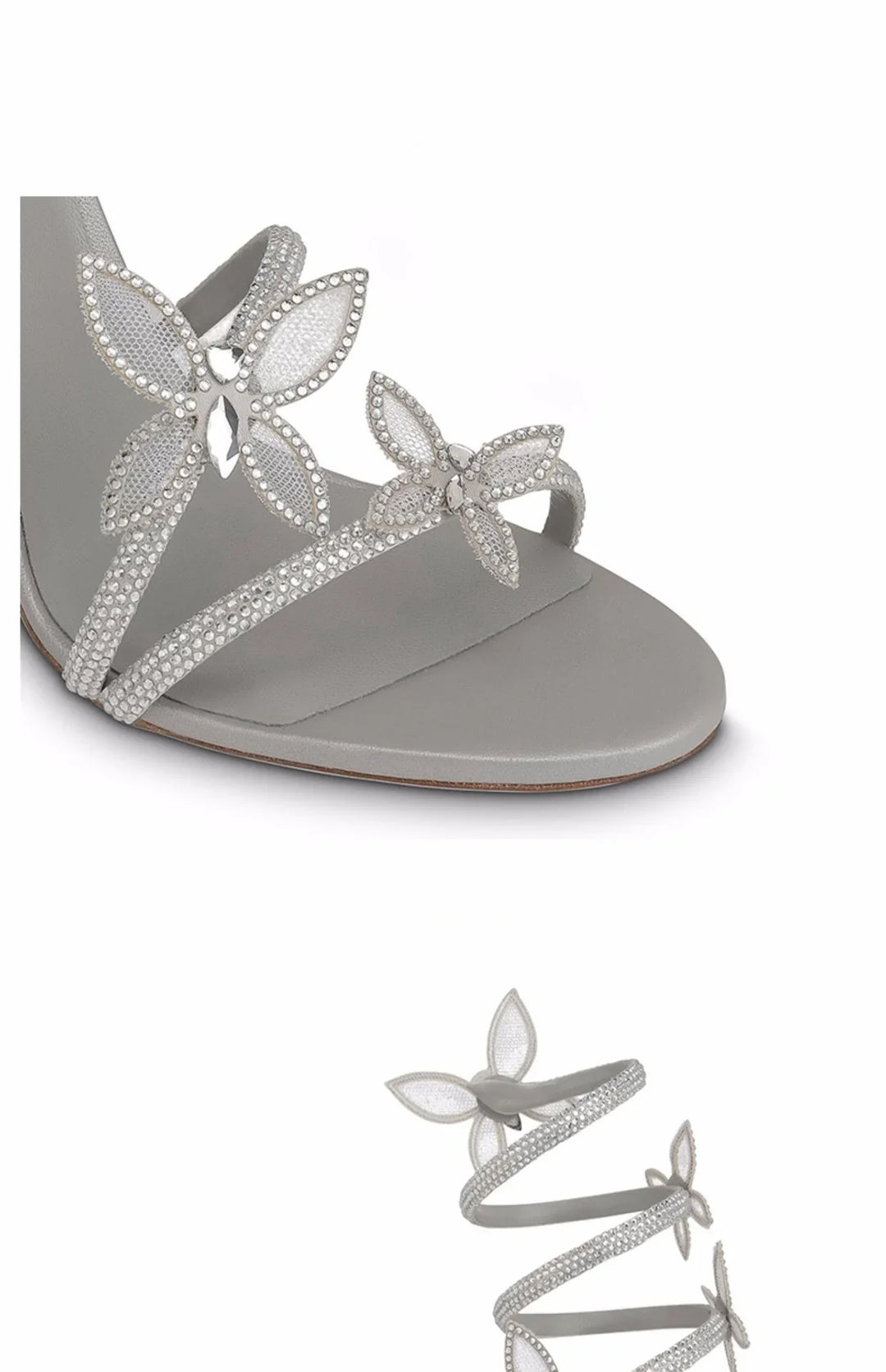 Elegant silver strappy sandal adorned with crystal butterfly embellishments and wraparound design
