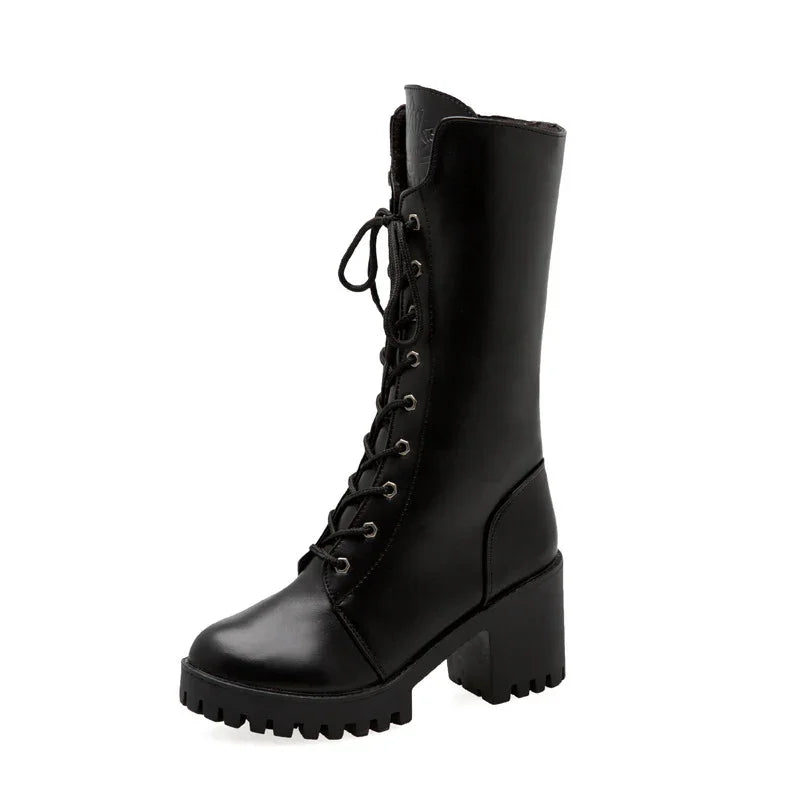 Black leather lace-up combat boots with chunky heel and rugged sole