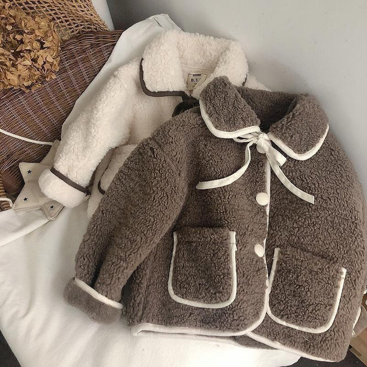 Two cozy sherpa fleece jackets, one brown and one cream, with contrasting trim and button details