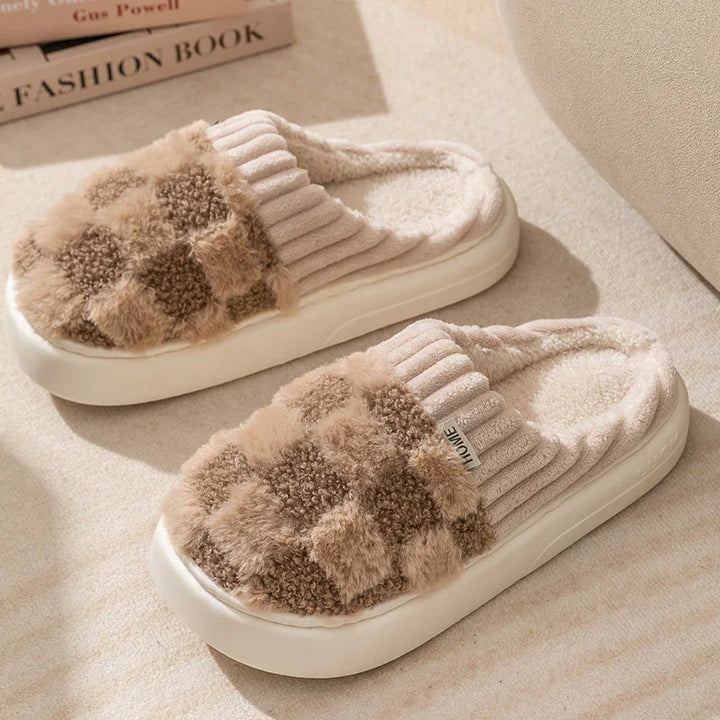 Beige and brown checkered plush indoor slippers with soft fleece lining and cushioned white soles