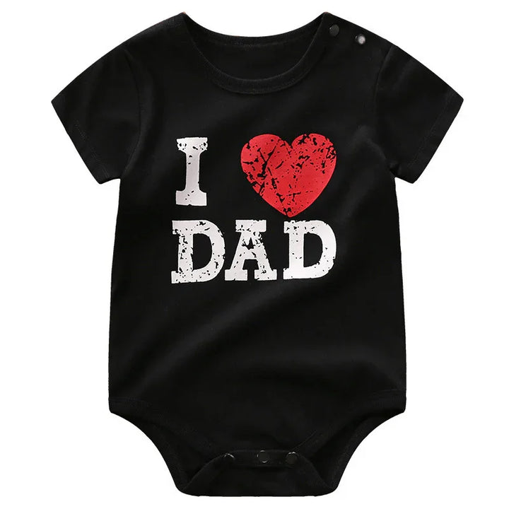 Black baby onesie with I love Dad text and red heart design