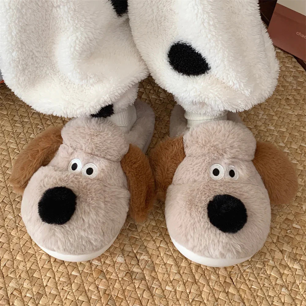 Fuzzy dog face slippers with floppy ears worn on feet over beige woven rug