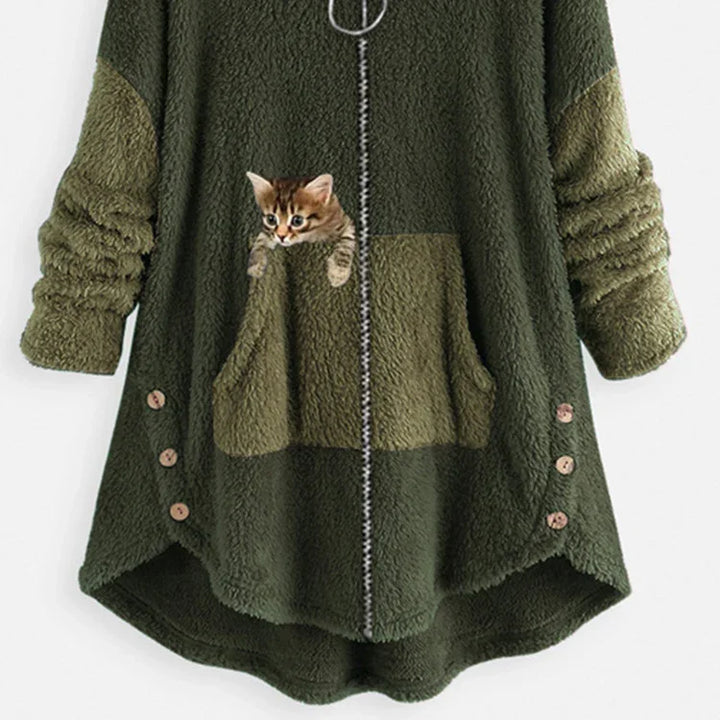 Cozy green fleece jacket with large front pockets, zipper, and a kitten peeking out of one pocket