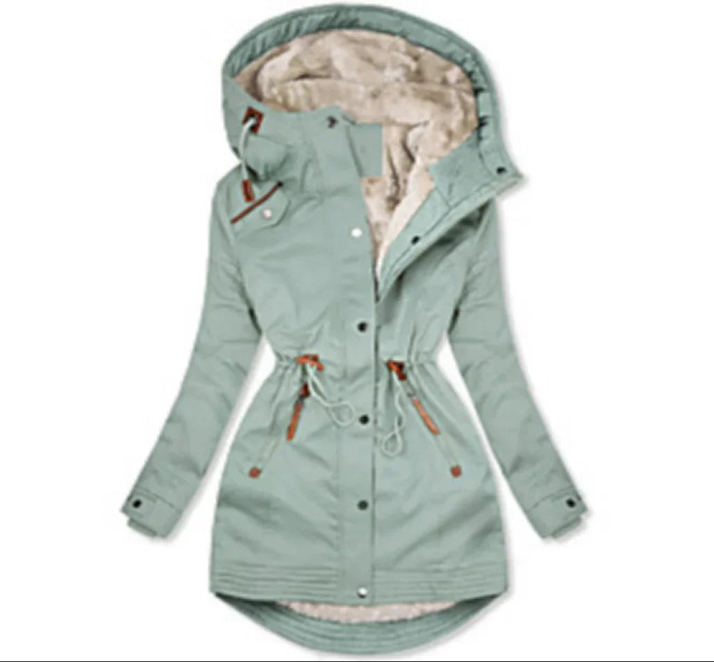 Light green women's winter parka with faux fur lining, hood, and adjustable waist drawstrings
