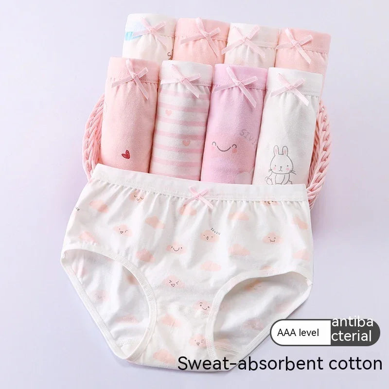 Set of pink and white cotton girls' underwear with cute prints and small bows, sweat-absorbent fabric