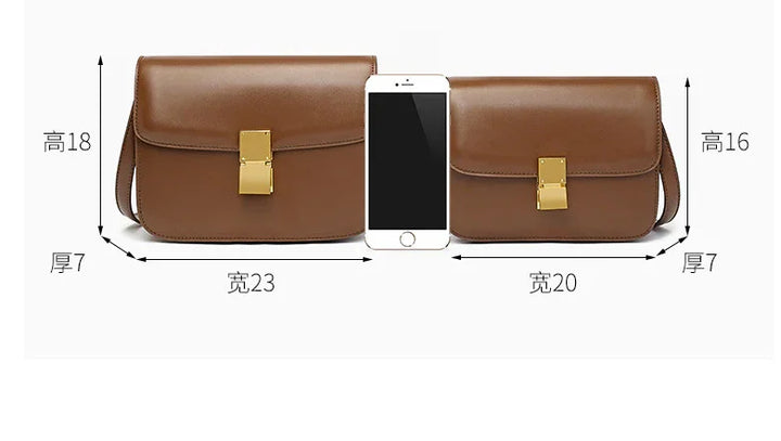Two brown leather shoulder bags with gold clasps beside a smartphone for size comparison, showing dimensions in centimeters