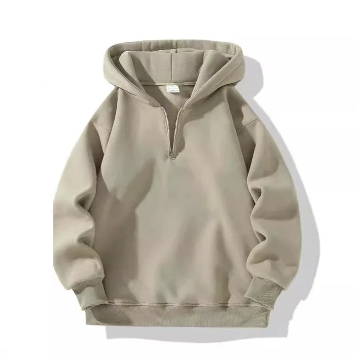 Beige half-zip pullover hoodie with ribbed cuffs and hem on white background