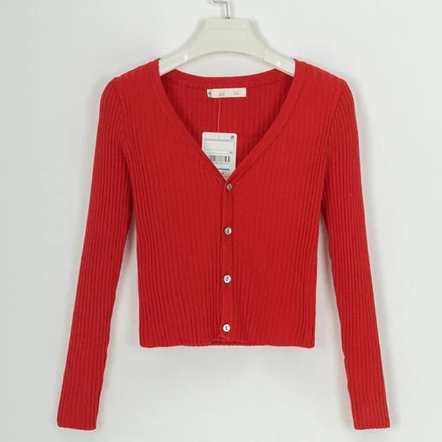 Red ribbed V-neck cardigan with long sleeves and button closure on a white hanger