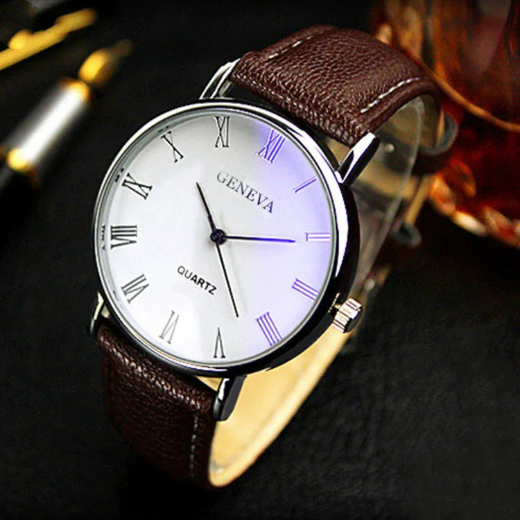Geneva quartz wristwatch with white dial, black Roman numerals, silver case, and brown leather strap