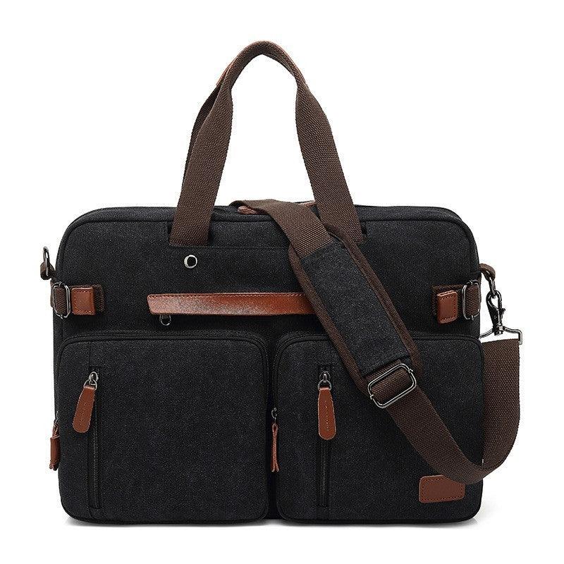 Black canvas briefcase with brown leather accents, two front pockets, and adjustable shoulder strap