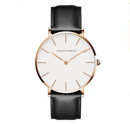 Minimalist Hannah Martin wristwatch with white dial, rose gold case, and black leather strap