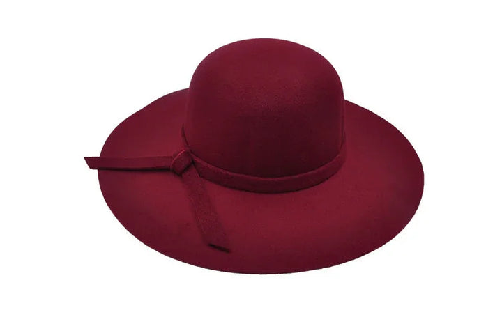 Elegant burgundy wide-brimmed felt hat with simple ribbon bow detail