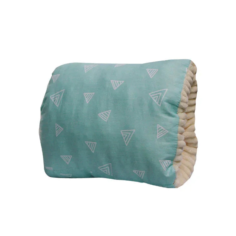 Blue cushion with white triangular patterns and beige textured sides