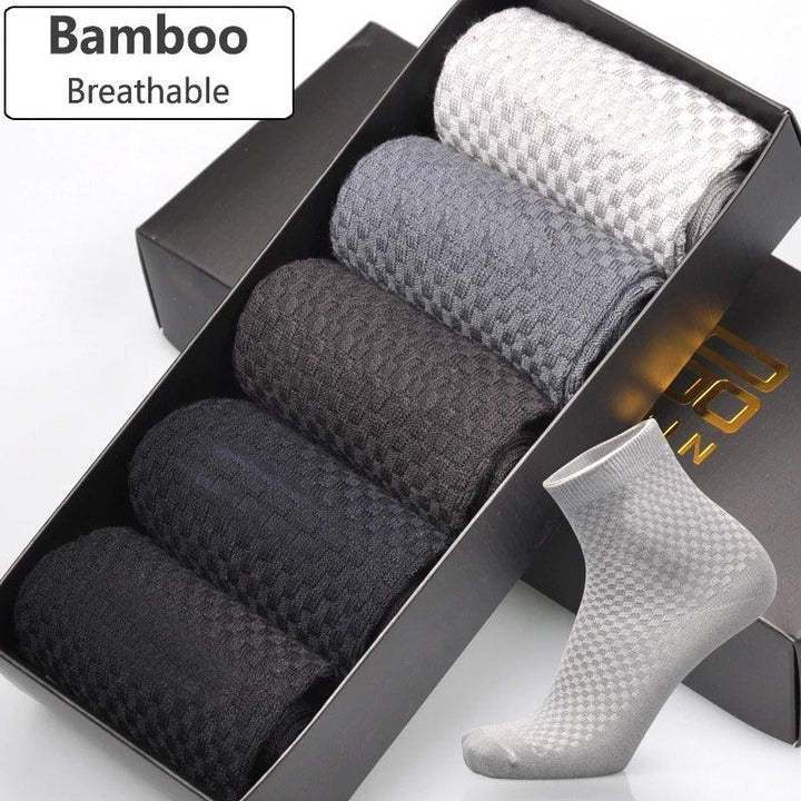 Set of five breathable bamboo socks in black, navy, dark gray, gray, and white in a black gift box