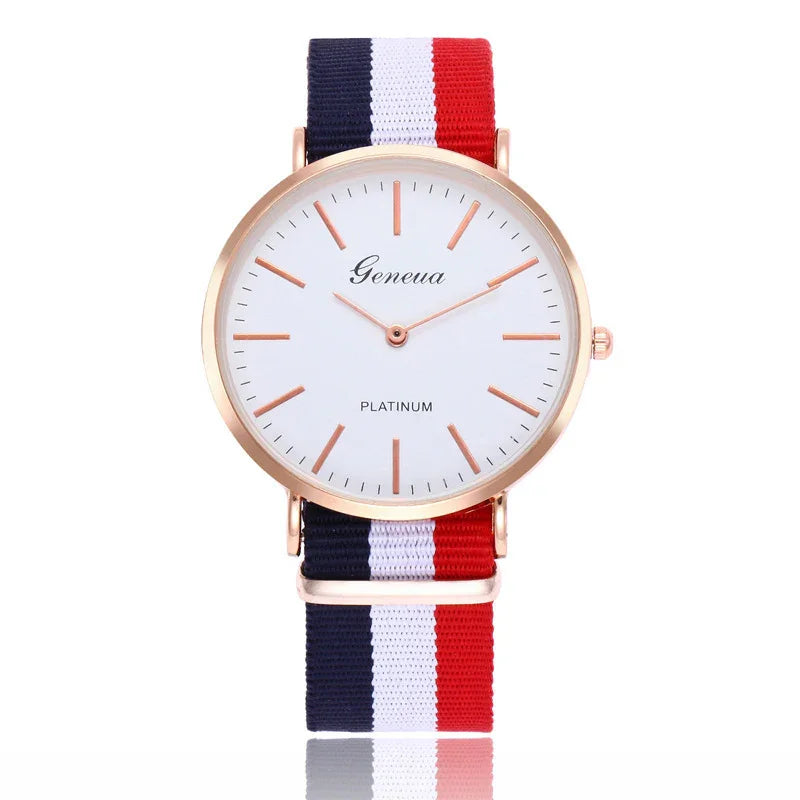 Geneva platinum watch with minimalist white dial and red white blue striped nylon strap