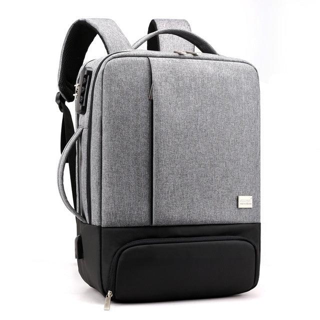 modern gray and black laptop backpack with USB charging port and multiple compartments