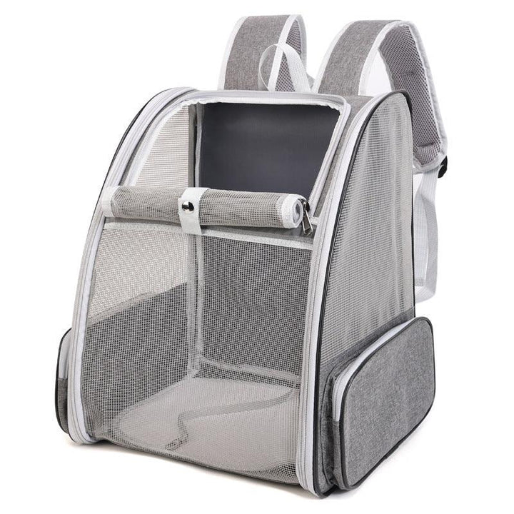 Gray and white mesh pet carrier backpack with pockets, roll-up front panel, and padded straps