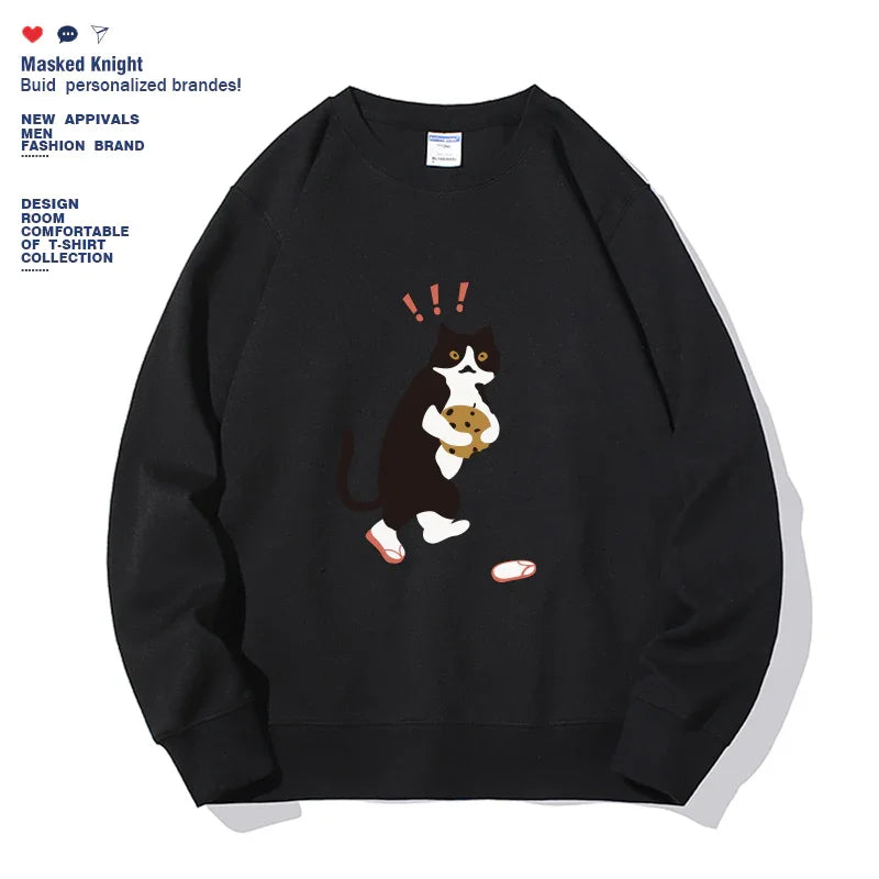 Black sweatshirt featuring a surprised cat holding a cookie with fallen slippers design