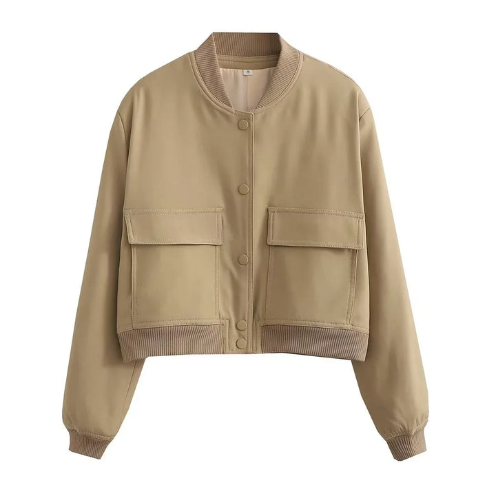 Beige cropped bomber jacket with snap buttons, large front pockets, and ribbed cuffs and hem