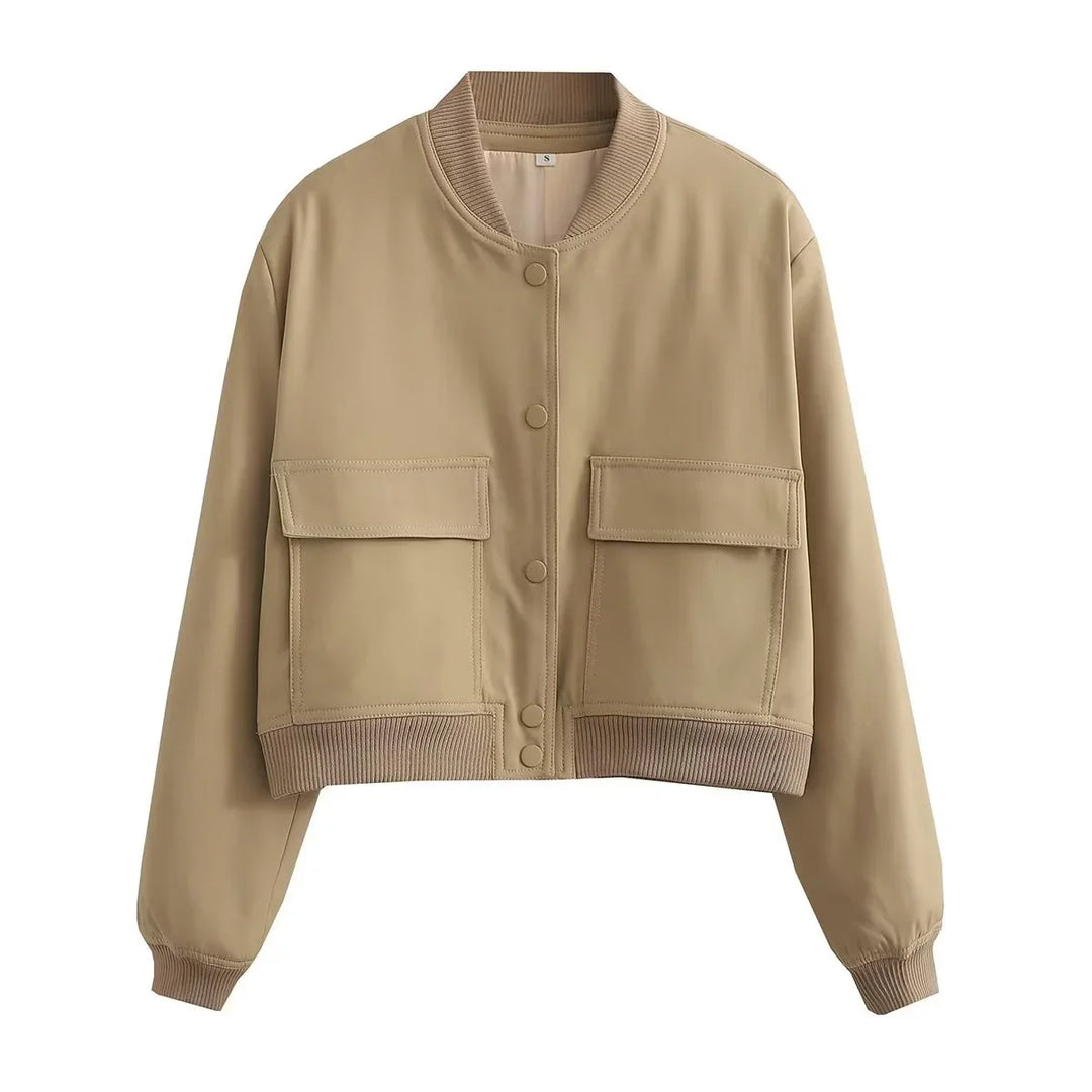 Beige cropped bomber jacket with large front pockets and snap buttons on white background