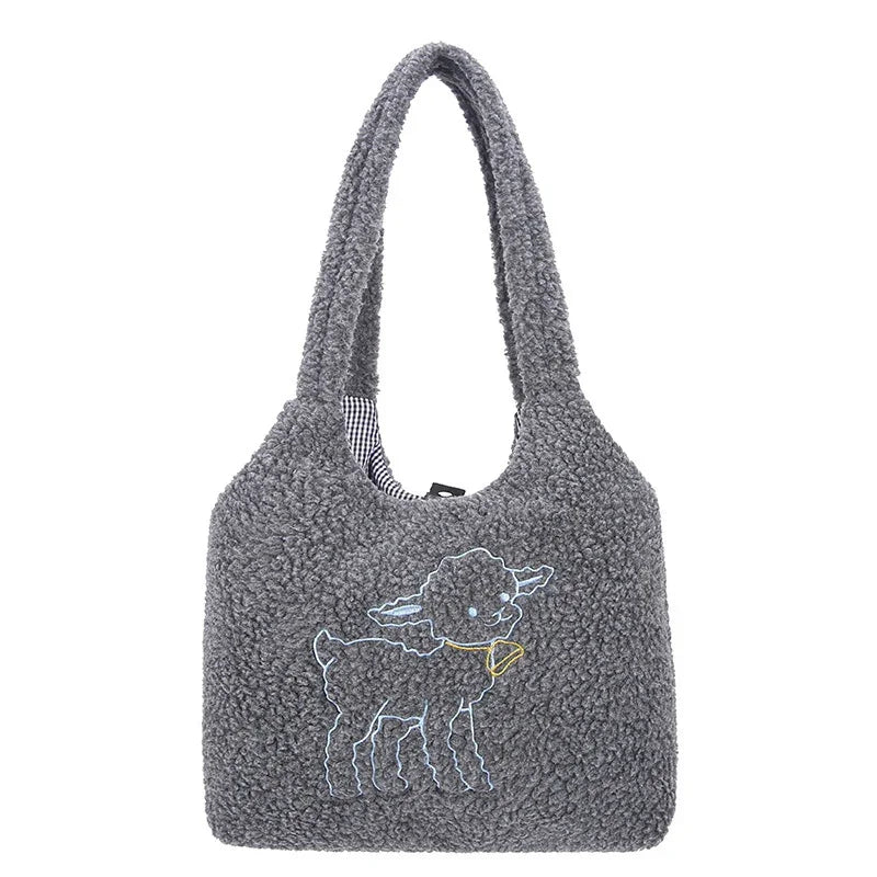 Gray sherpa tote bag with embroidered lamb design and gingham interior lining
