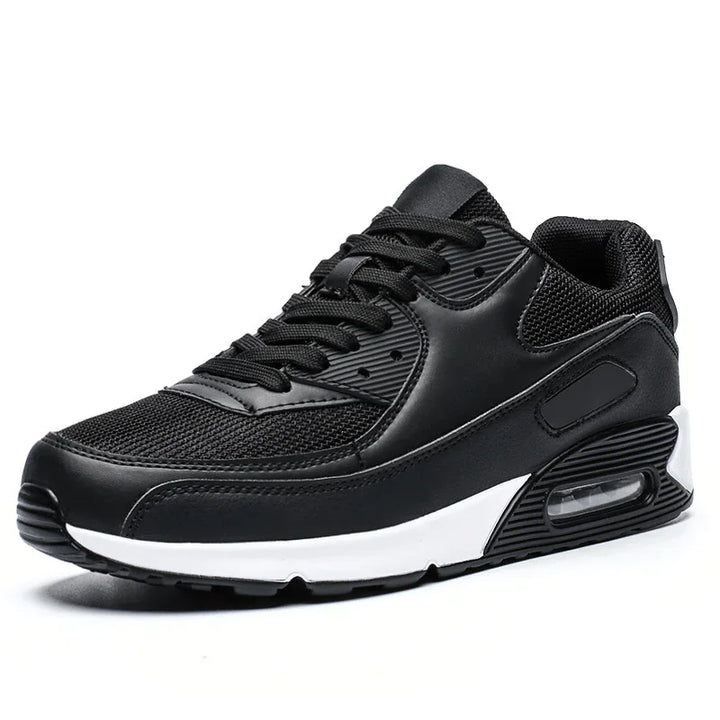 Black athletic sneaker with mesh and synthetic upper, white midsole, and visible air cushioning