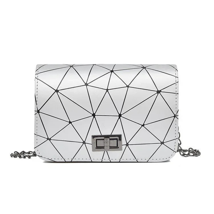 White geometric crossbody bag with black triangular lines and metal chain strap