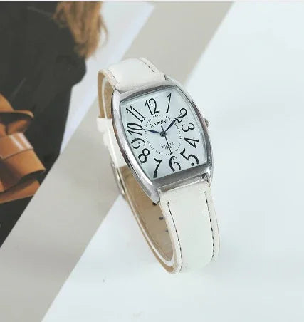 Elegant white leather strap wristwatch with rectangular face and black numerals on white dial