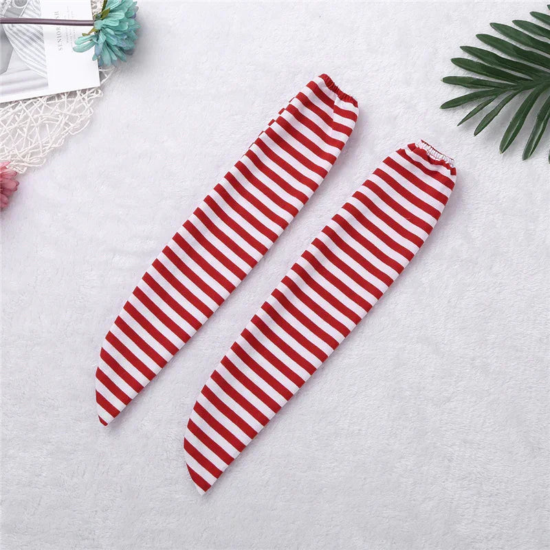 Pair of red and white striped fabric arm sleeves with elastic ends on white textured background