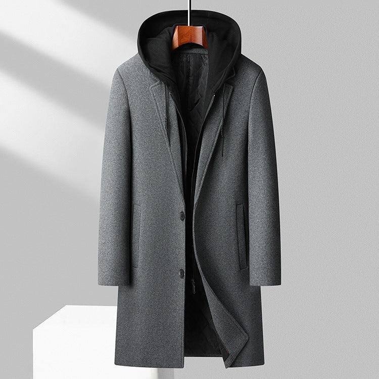 Gray men's wool blend overcoat with black hooded inner lining, hanging on wooden hanger