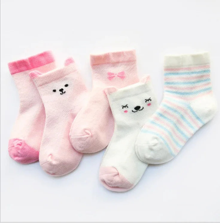 Set of five pastel baby socks with bear faces, bows, and stripes in pink, white, and blue