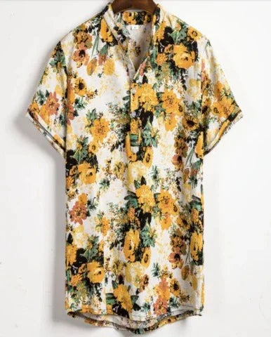 Short-sleeve white shirt with yellow and orange floral print hanging on wooden hanger