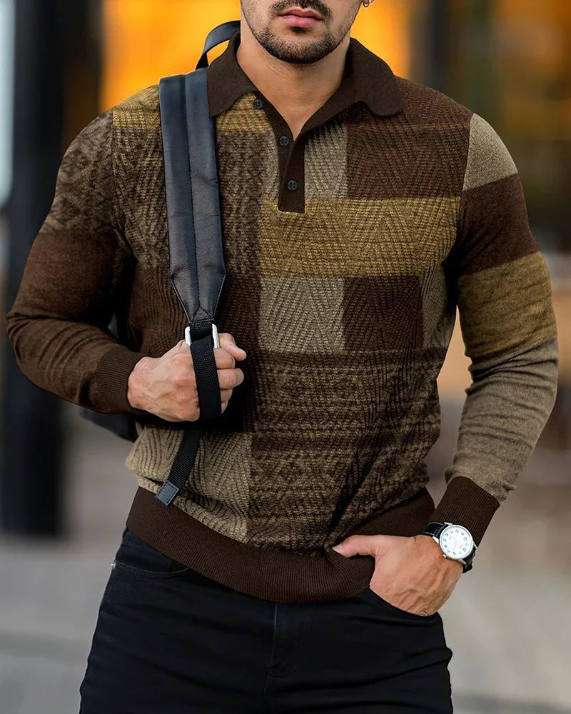 Man wearing brown and beige checkered pullover sweater with black collar, holding black backpack strap