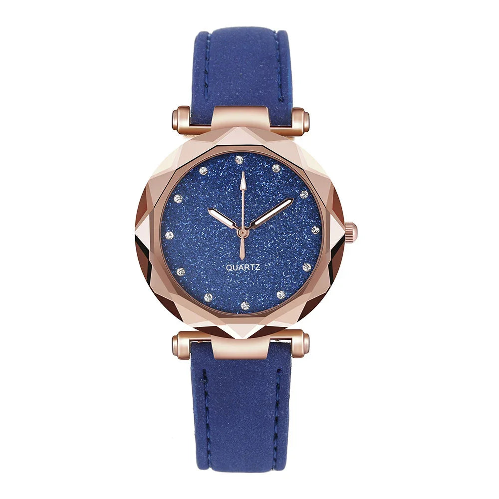 Rose gold quartz watch with blue glitter dial and blue leather strap