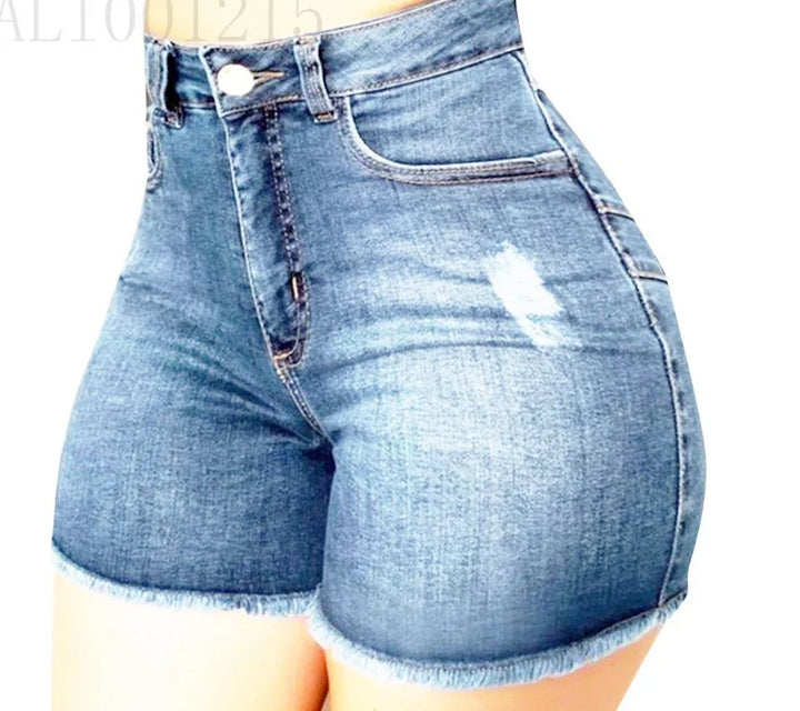 close-up of woman wearing high-waisted blue denim shorts with frayed hems and distressed detail