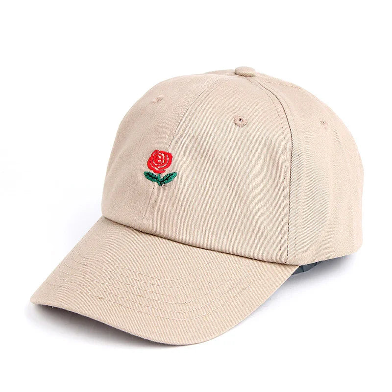Beige baseball cap with small red rose embroidery on front panel