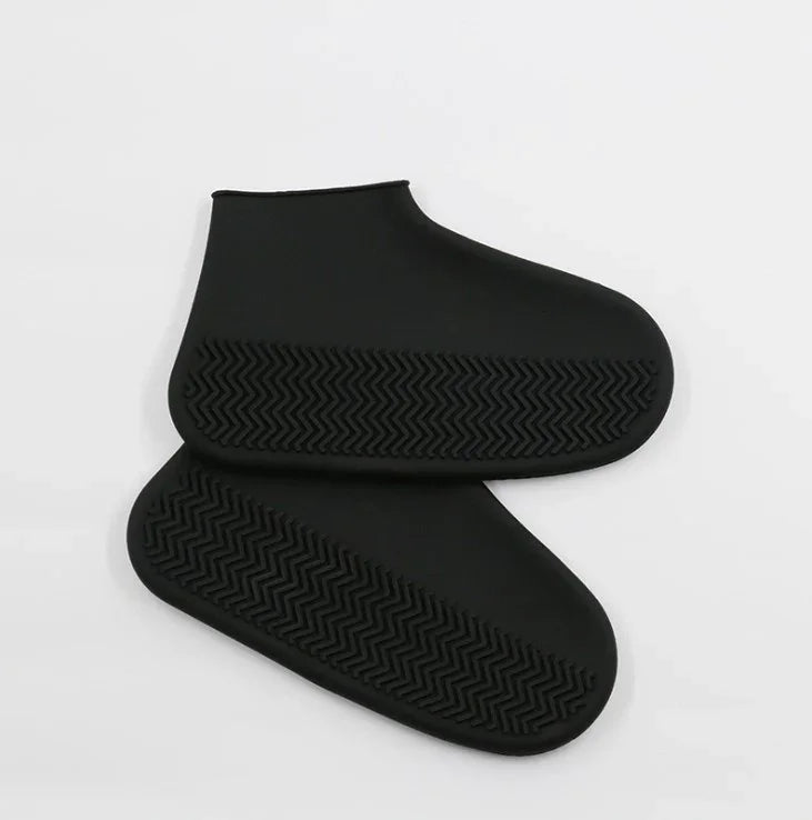 Pair of black silicone waterproof shoe covers with textured non-slip soles