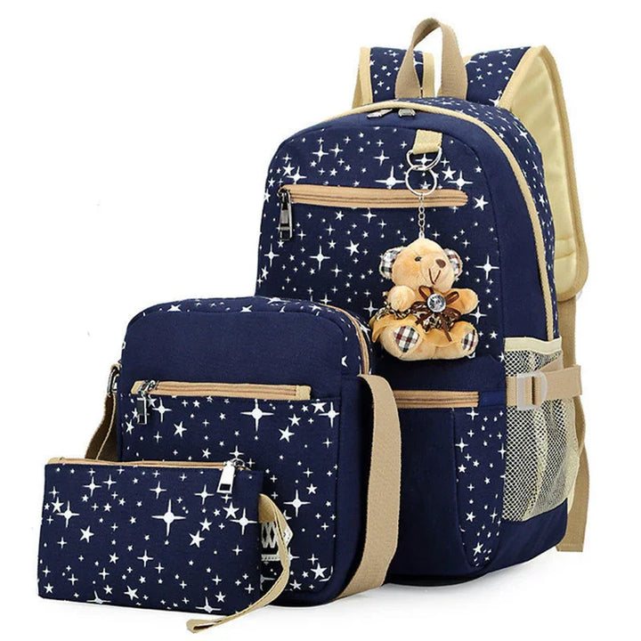 Navy blue star print backpack set with teddy bear keychain, including matching shoulder bag and pouch