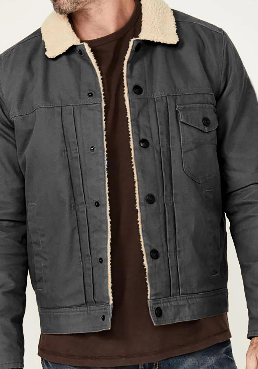 Men's charcoal gray denim jacket with cream sherpa collar and brown shirt