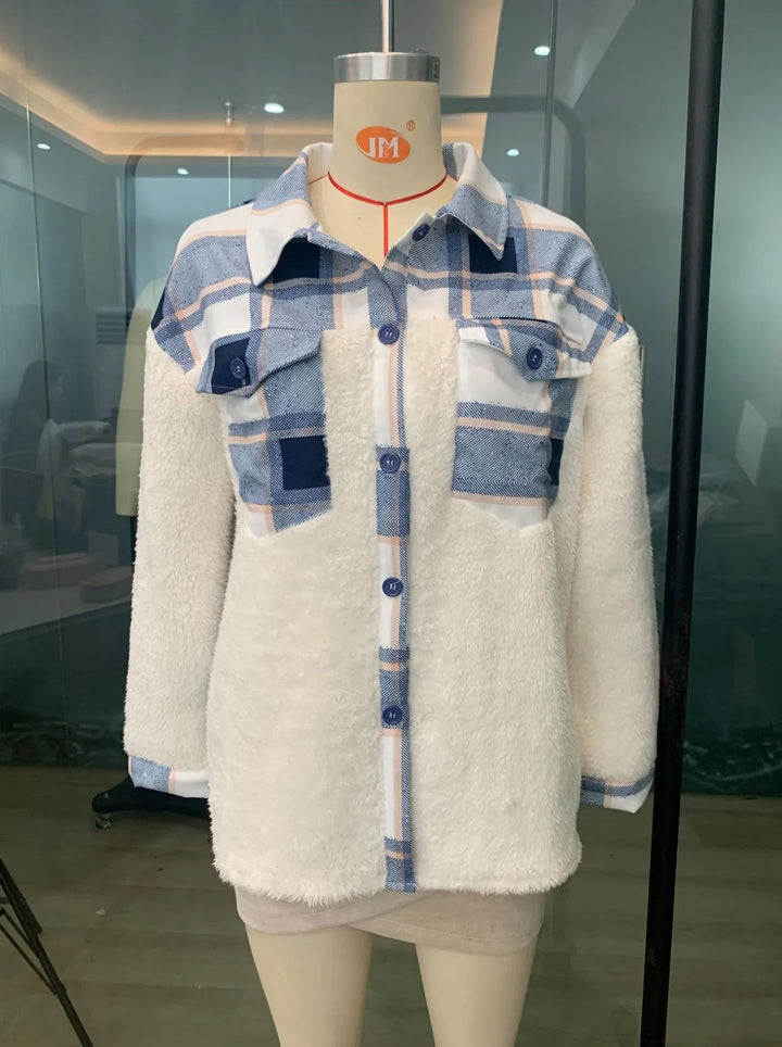 Women's sherpa fleece jacket with blue plaid pattern and button-up front on mannequin