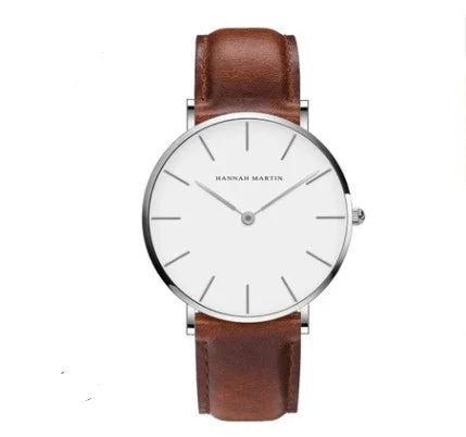Minimalist Hannah Martin wristwatch with silver case, white dial, and brown leather strap