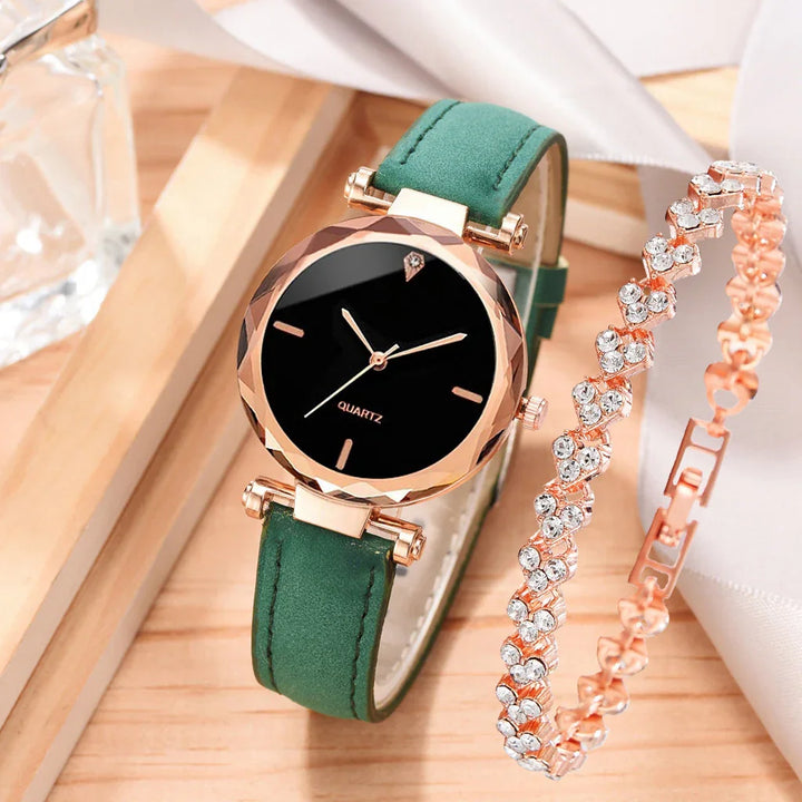 elegant quartz wristwatch with green leather strap and rose gold crystal bracelet on wooden surface