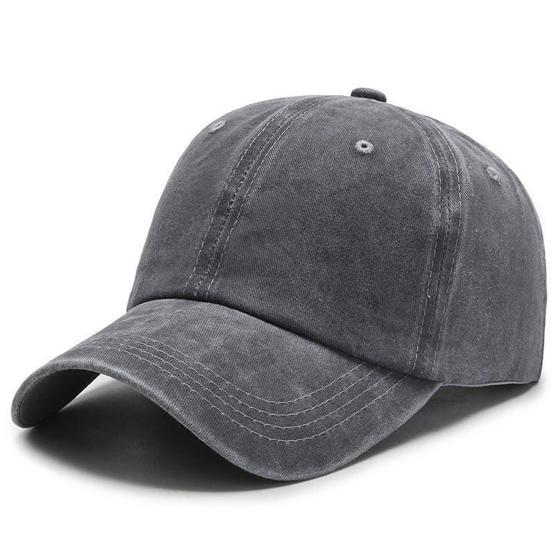 Dark gray washed cotton baseball cap with curved brim and stitched panels